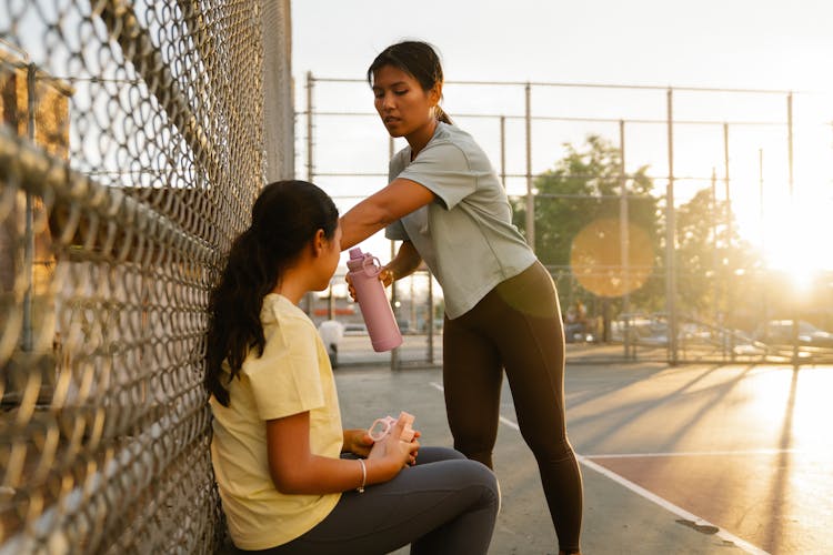 Young Women Inside An Open Court