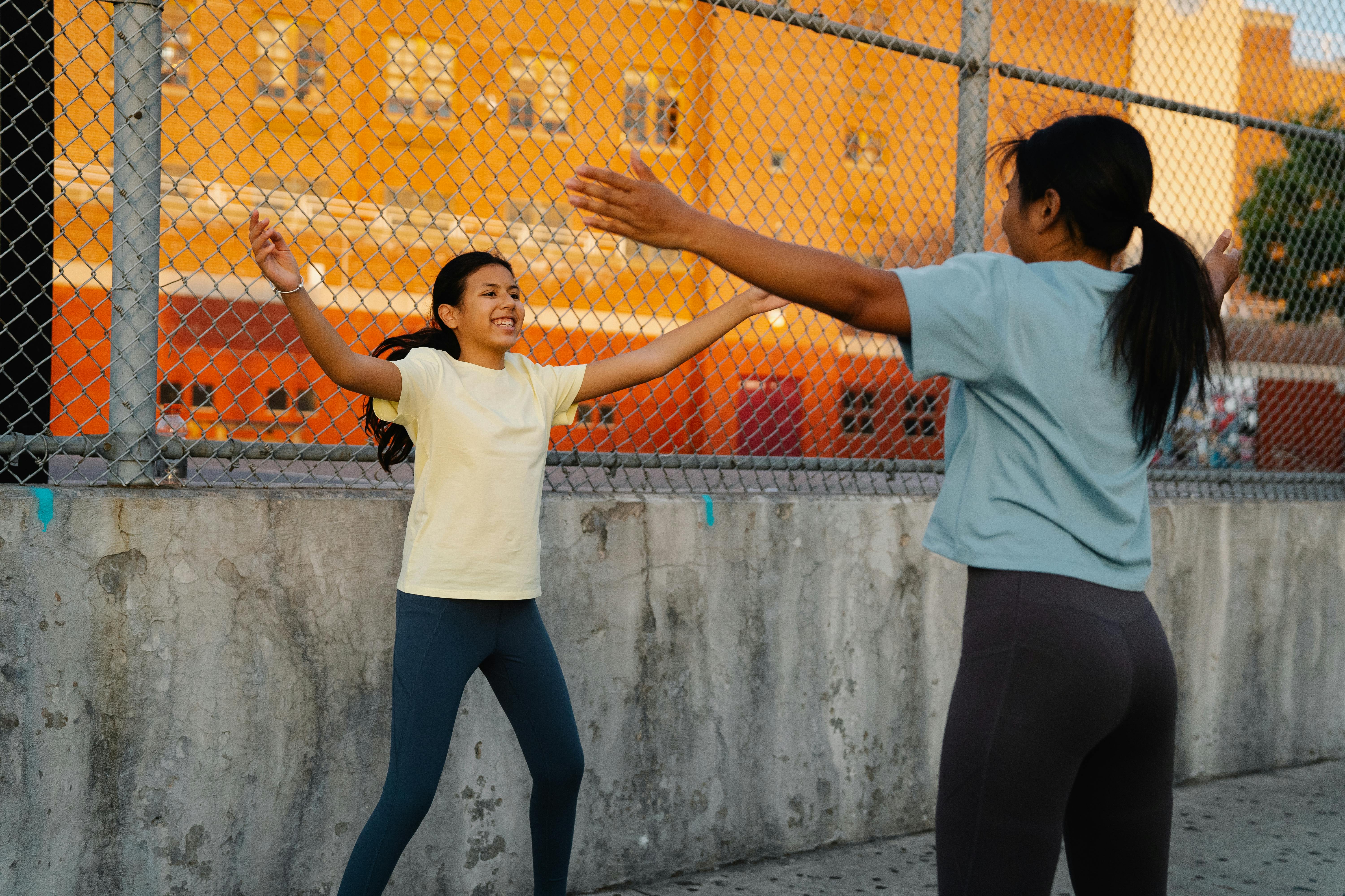 young women exercising together