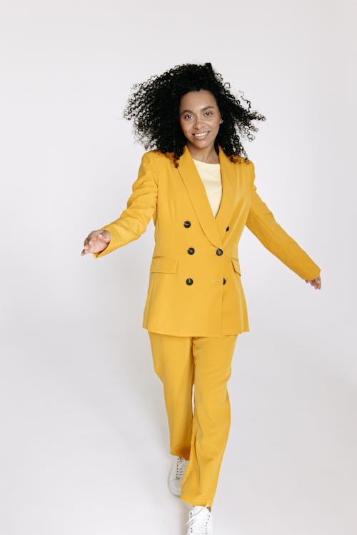 Woman in Yellow Suit and Yellow Pants