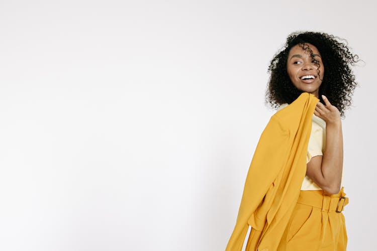 Pretty Woman Wearing Yellow Outfit Posing