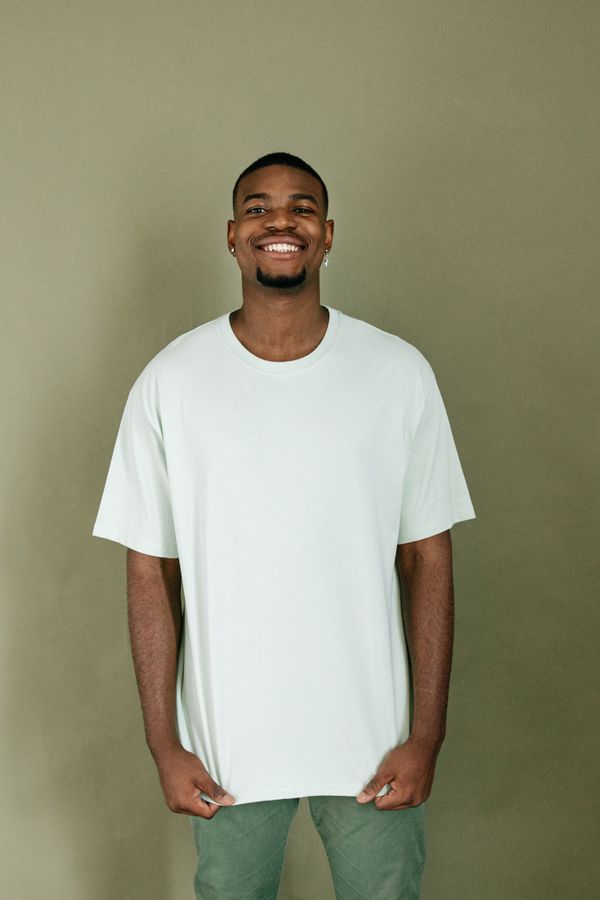 Model wearing a boxy tee — photo by Ivan S on Pexels