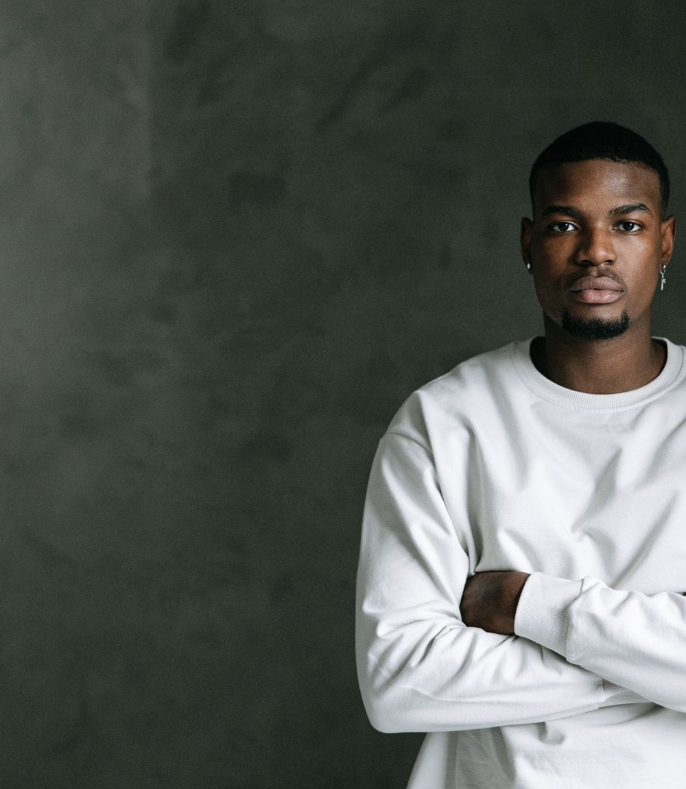 Man wearing a white crew neck long sleeve shirt