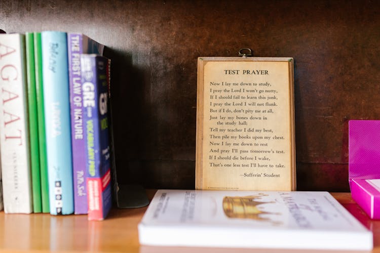 Books And Wooden Frame On Bookshelf