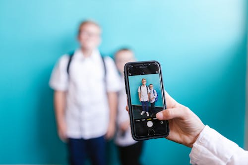 Free Person Taking Picture of Boys  Stock Photo