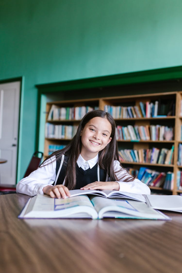 Girl Studying In The Library