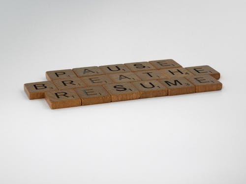 Wooden Scrabble Tiles on White Background