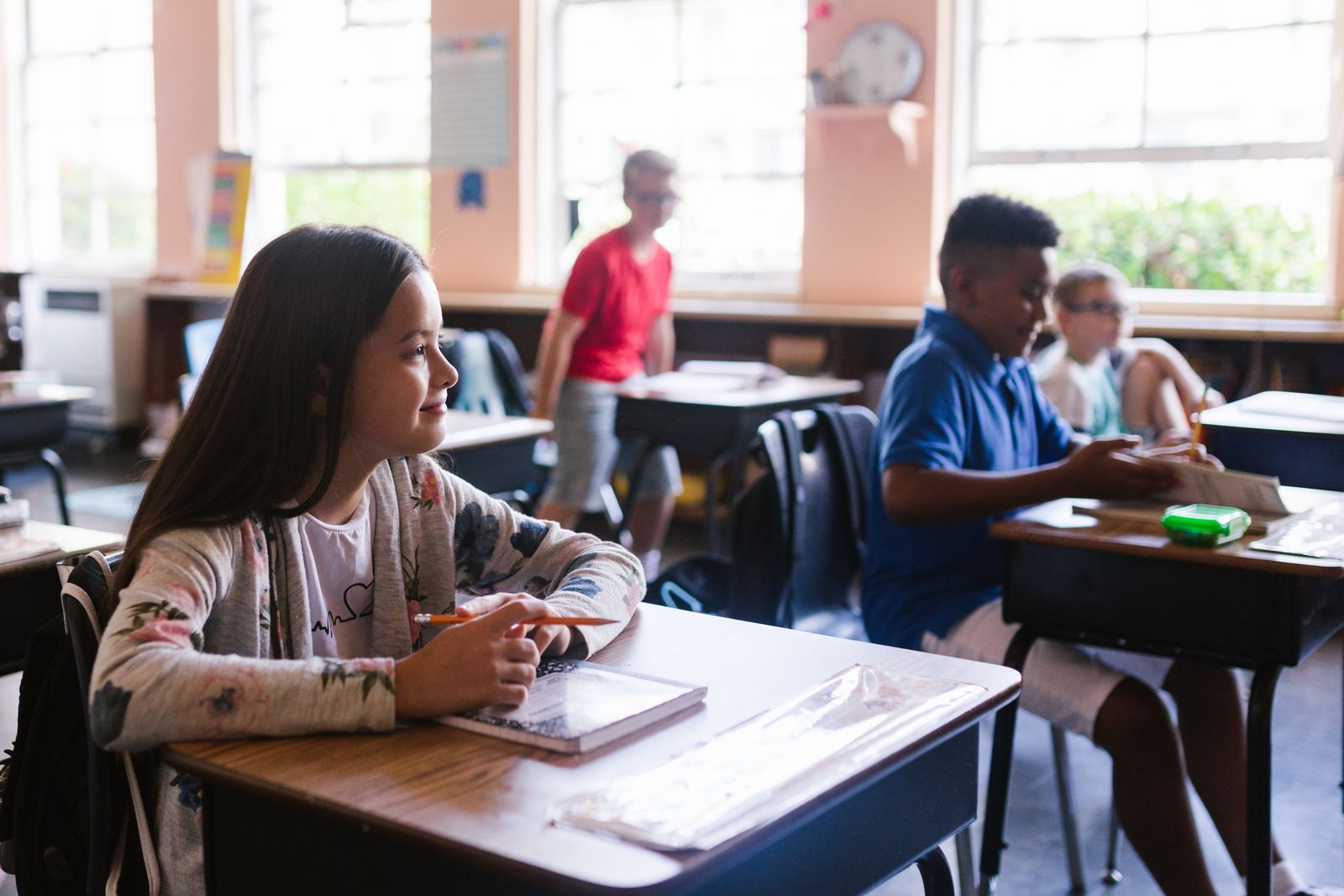 Children learning together in a bright classroom