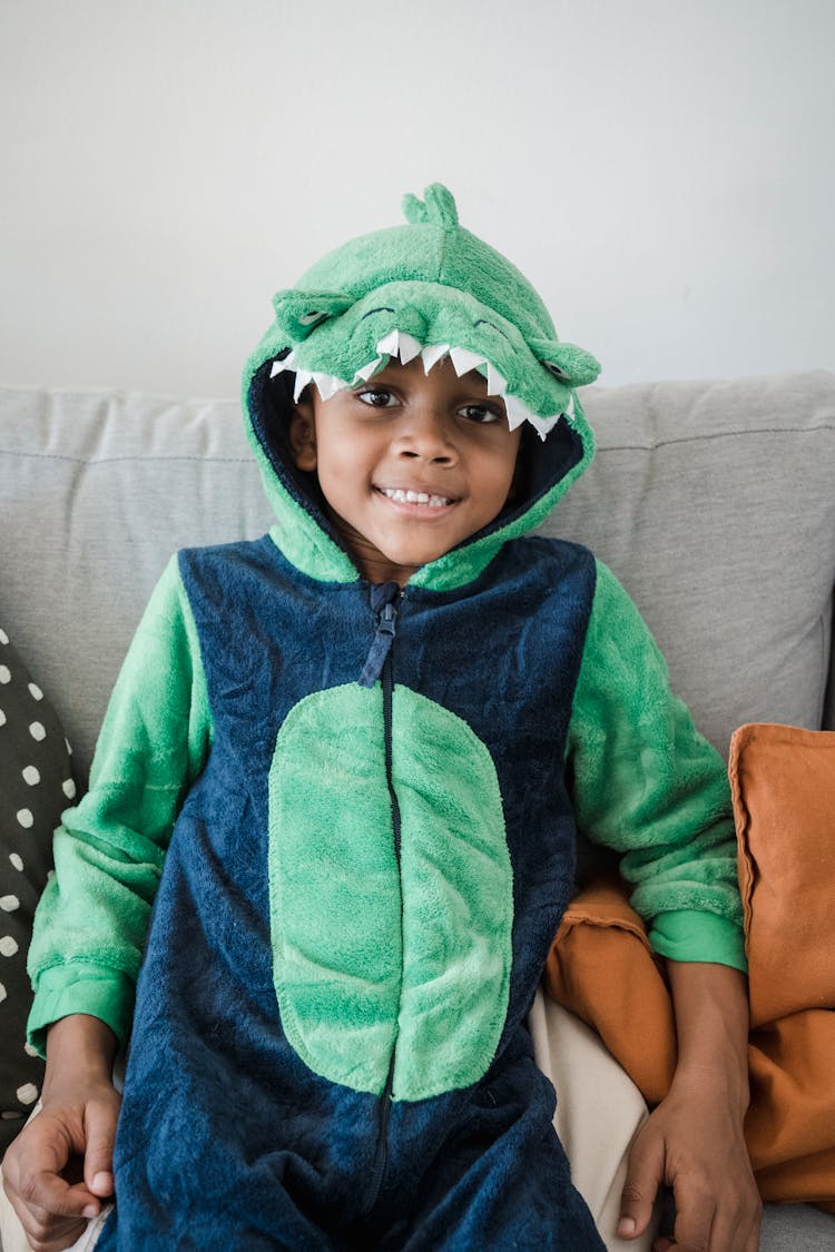 Smiling Kid In Dinosaur Costume