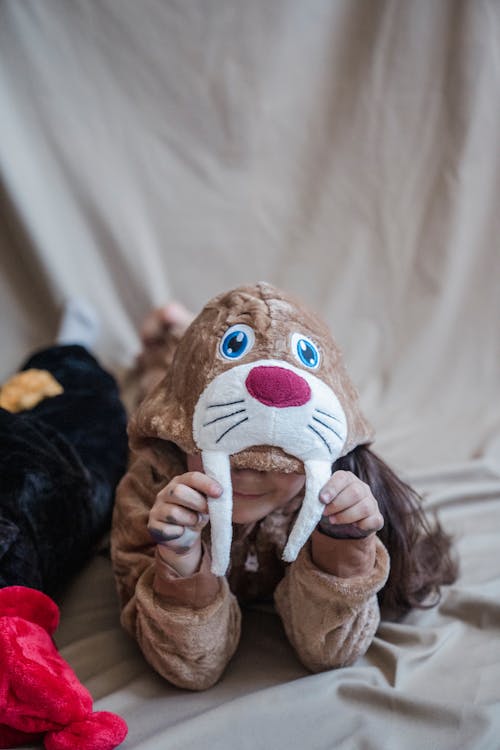 Girl in Walrus Costume Lying on the Floor