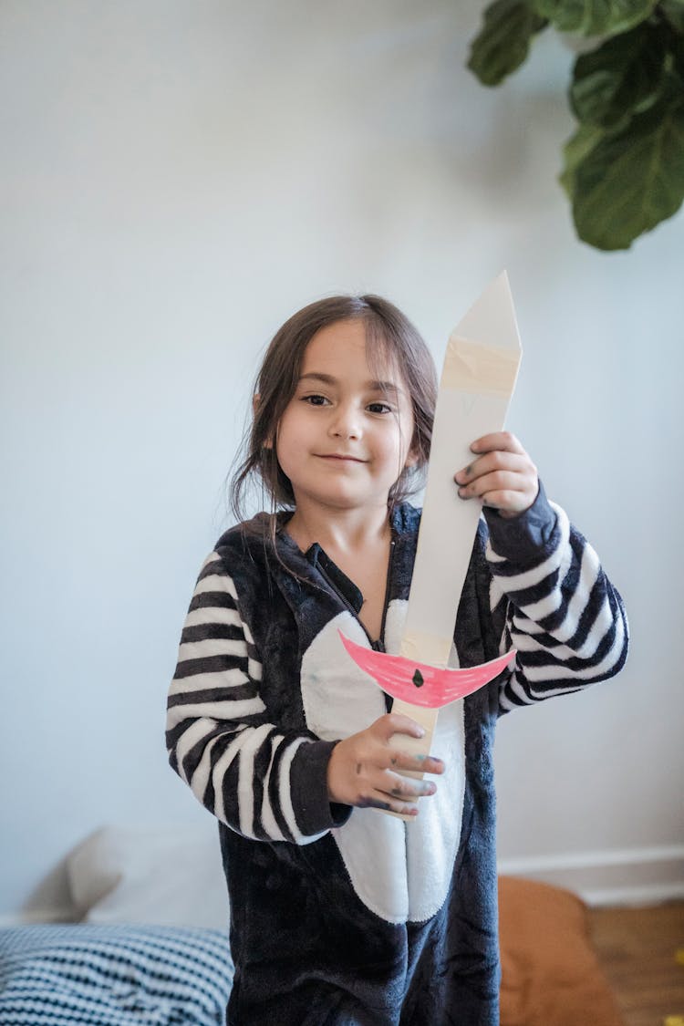 Girl With Toy Sword