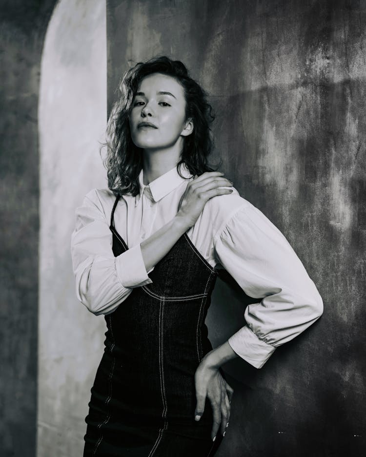 Model Posing In Shirt And Denim Dress