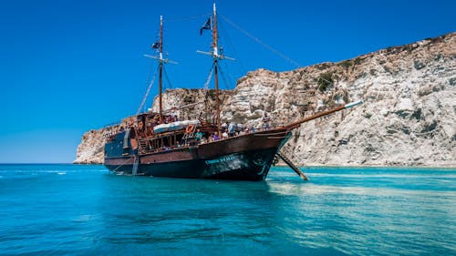 A Pirate Ship Sailing on Sea