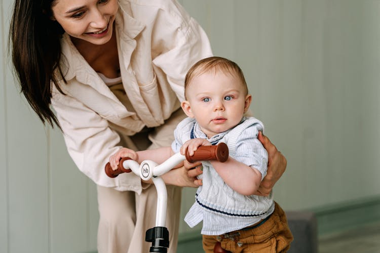 A Baby Biking Inside The House