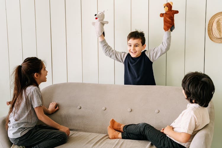 Children Playing Animal Puppets