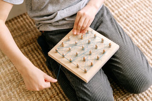 Kid Play a Board Game