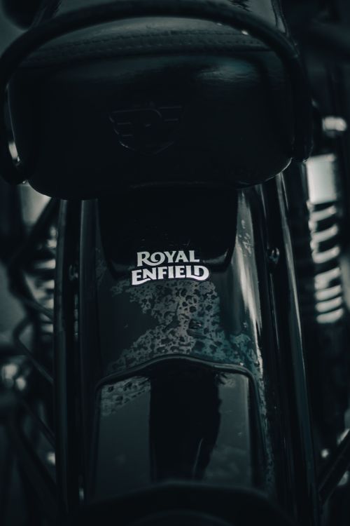 Free Detailed dark close-up view of a Royal Enfield motorcycle part. Stock Photo