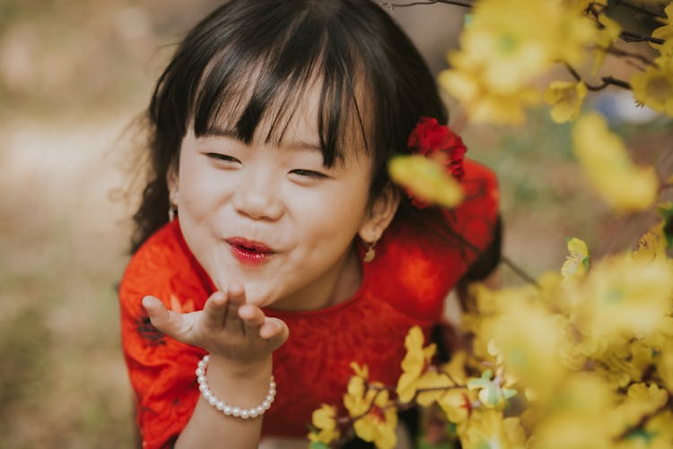 Cute Child Sending A Kiss