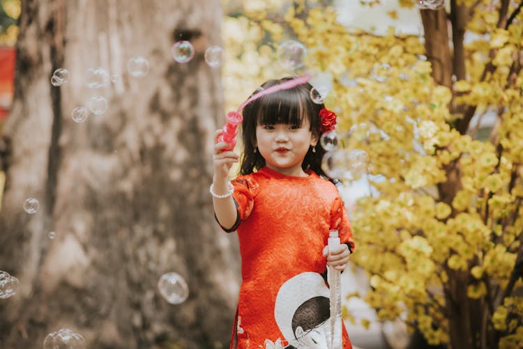 Girl Blowing Bubbles