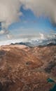 Mountains Under White Clouds