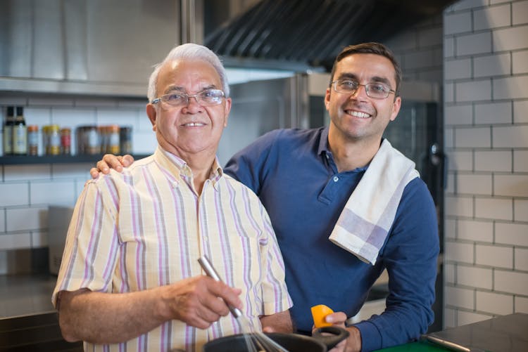 
Men Cooking In A Kitchen