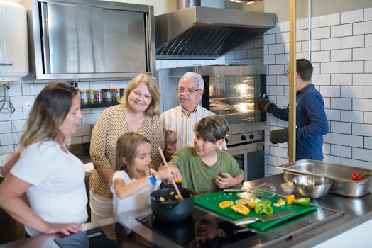 Multi-generational family preparing a meal together in a contemporary kitchen setting.