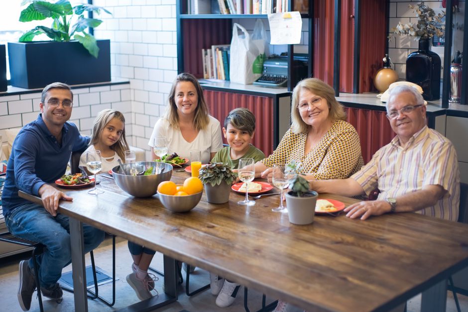 Photo by Kampus Production on Pexels Family sharing a meal at home, capturing joy and togetherness indoors.