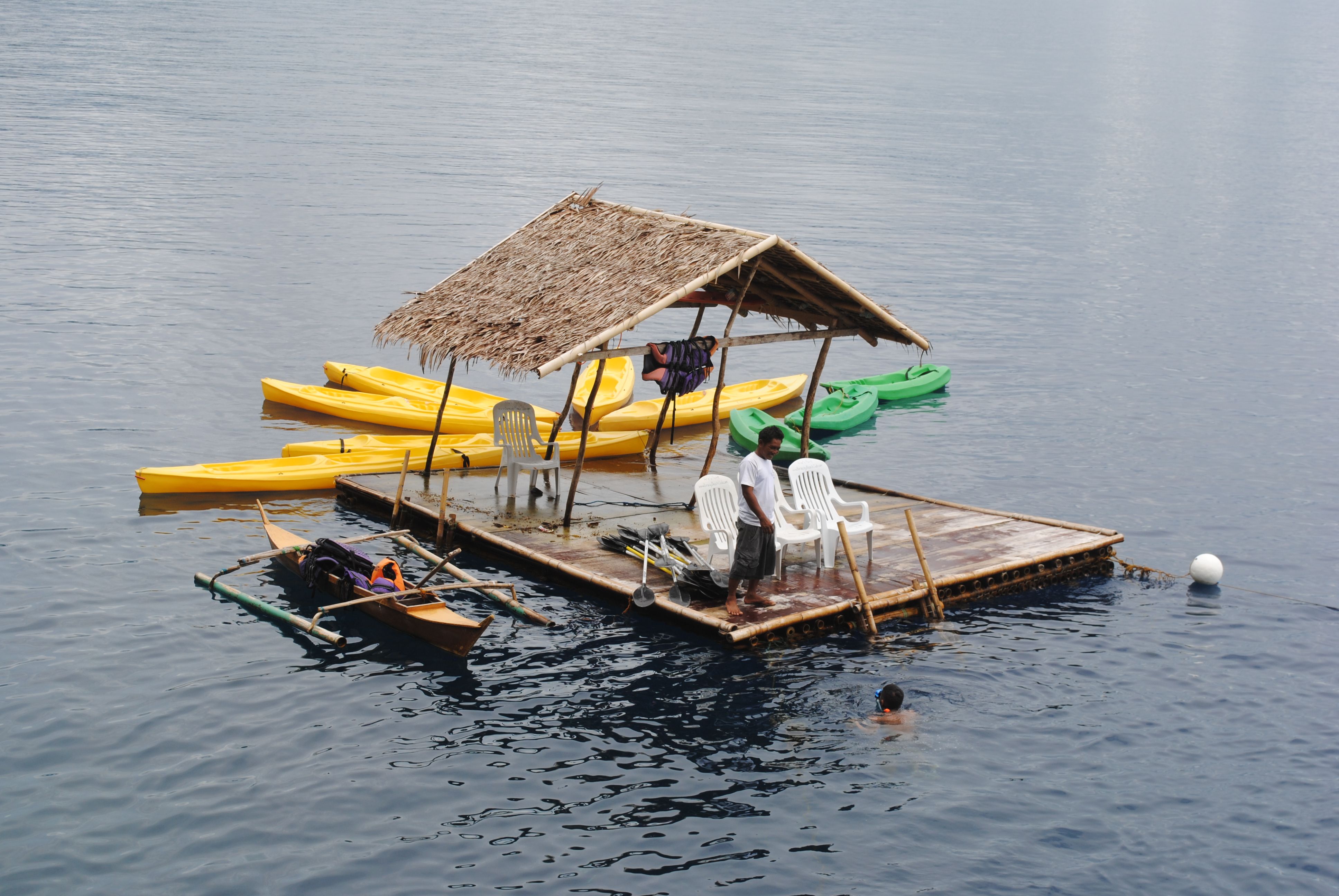 A Man Standing on the Raft · Free Stock Photo