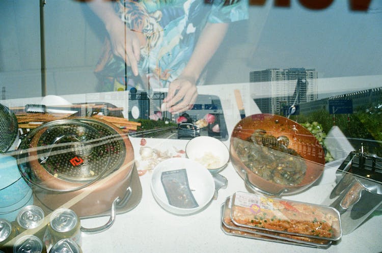 Double Exposure Shot Of Man Cooking Food And Car On The Highway