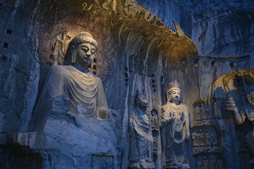 Free Buddha Statues in the Longmen Grottoes Stock Photo