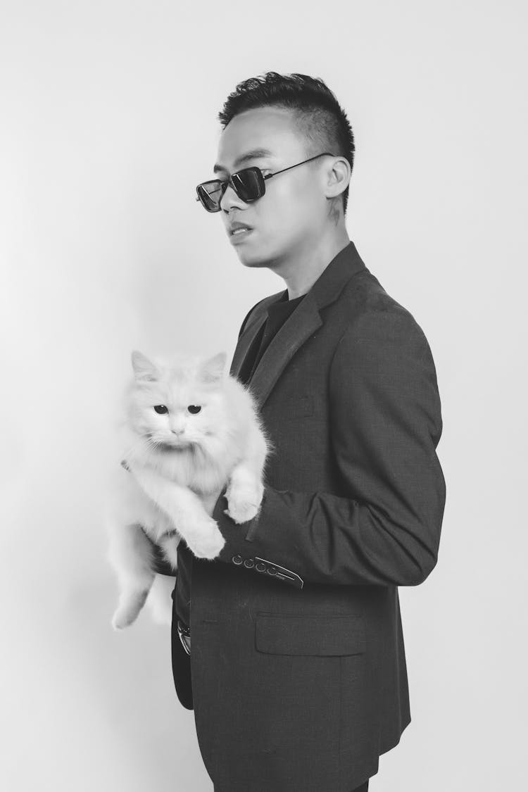 Handsome Man Holding A Cat