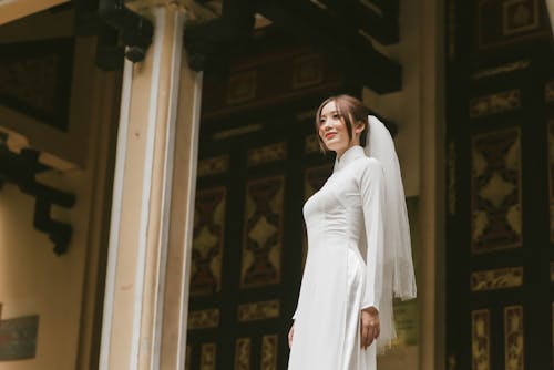 A Pretty Woman in White Wedding Dress