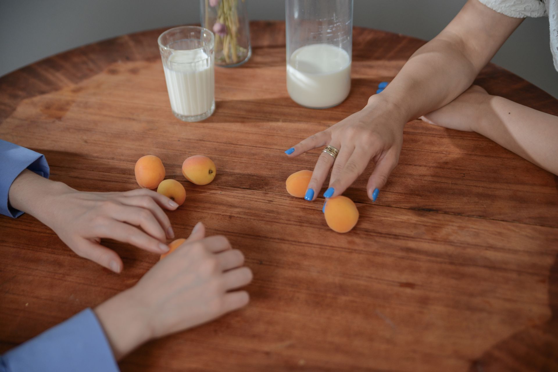 A Person Holding Peach Fruit