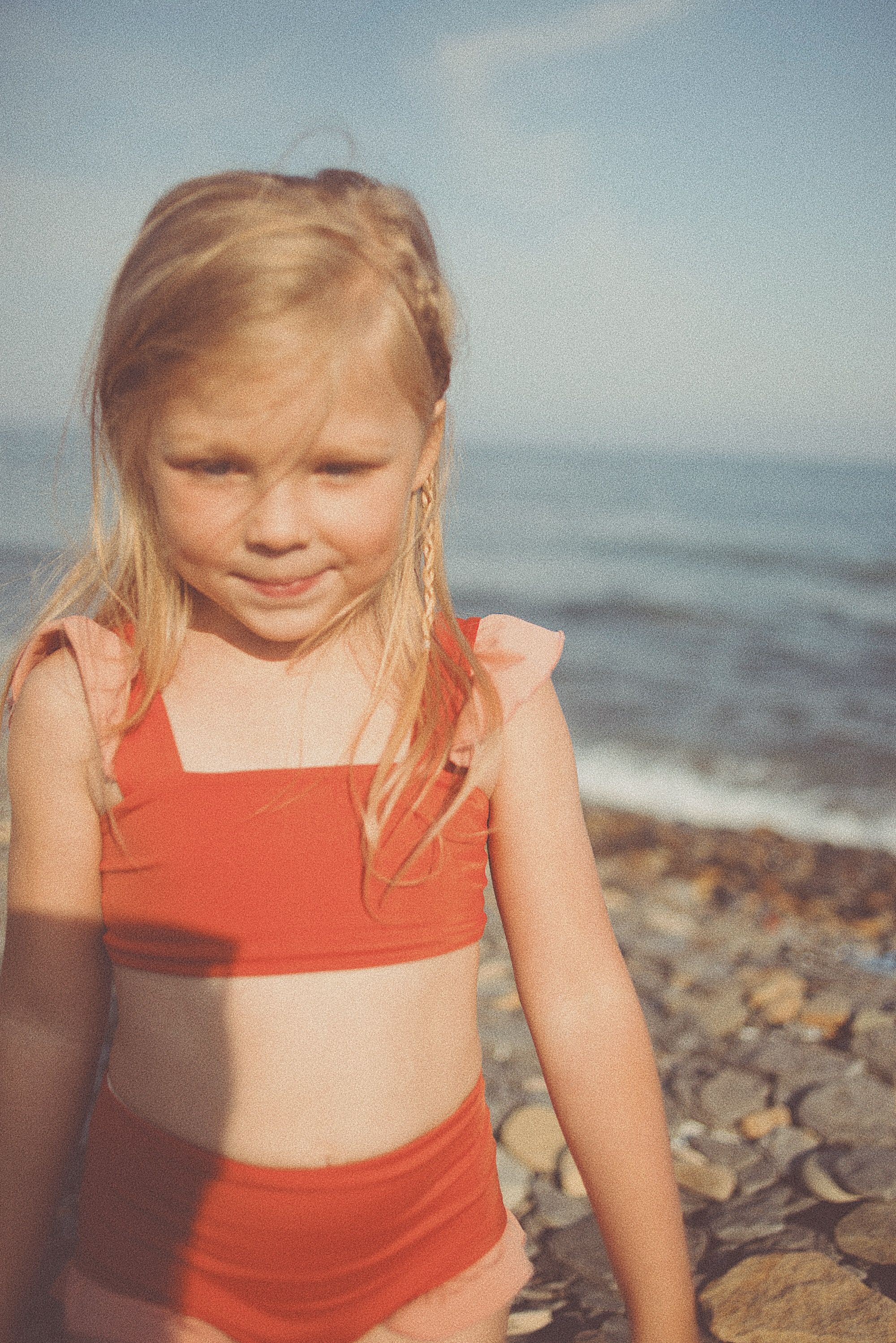 Photo of a Girl Wearing a Red Swimsuit · Free Stock Photo