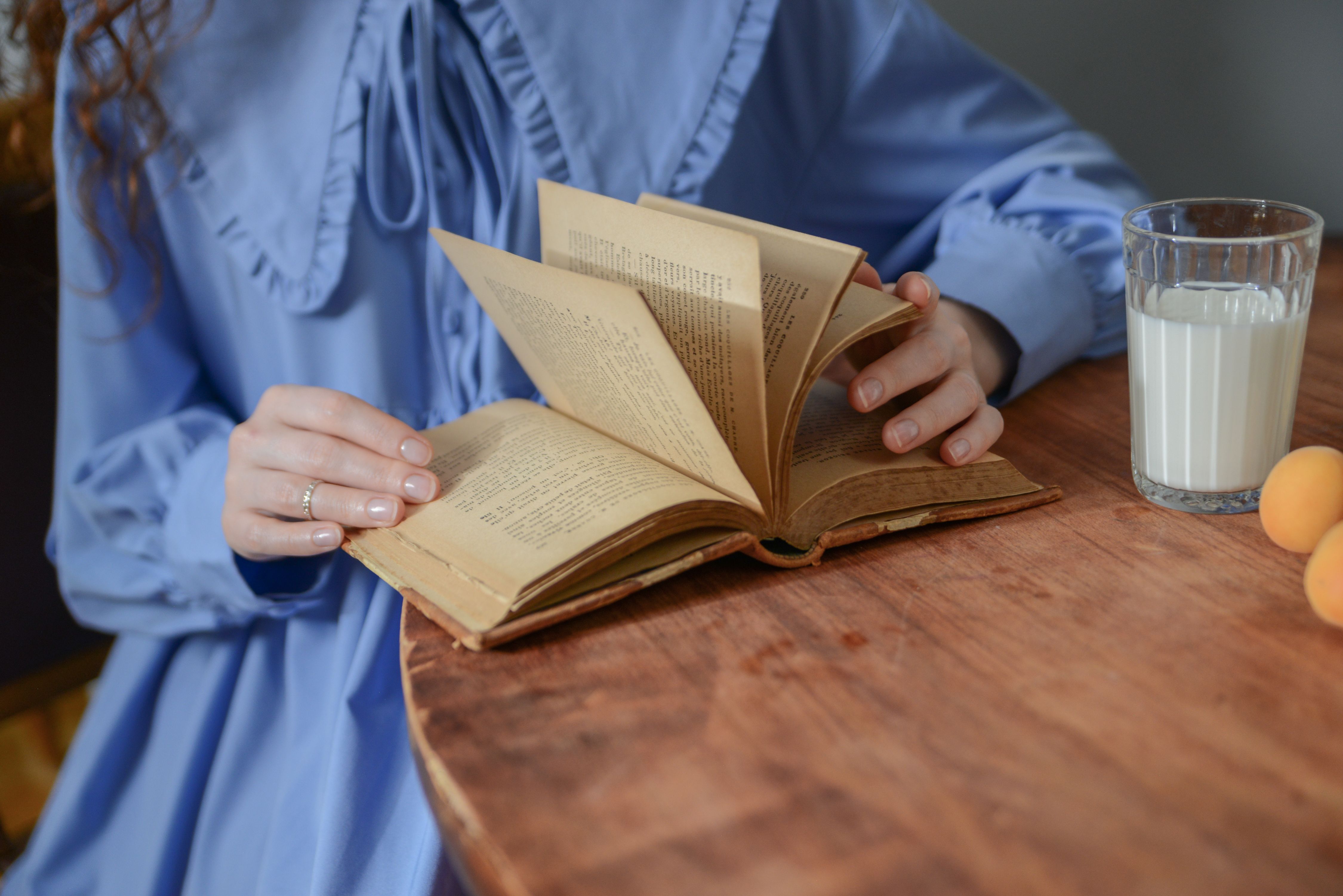 A Person Holding a Book · Free Stock Photo