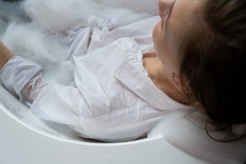 Gratis Fotos de stock gratuitas de abotonar, baño de burbujas, de cerca Foto de stock