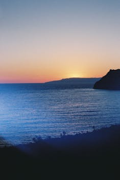 Stunning sunrise view over the sea in Patmos, Greece, capturing the serene beauty of the landscape.
