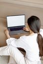 Woman in White Long Sleeve Shirt Using Macbook Pro