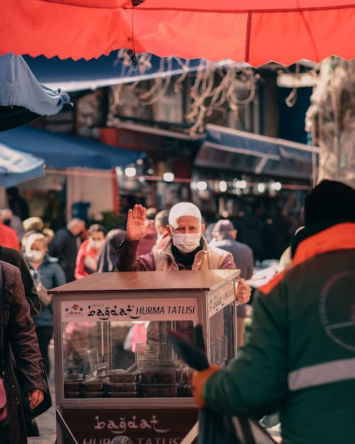 Male Street Vendor Selling Dates