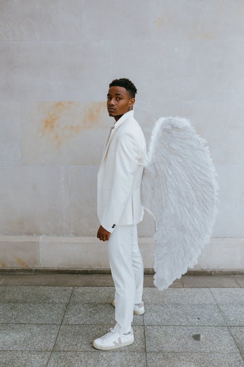 A Man Wearing an Angel Costume