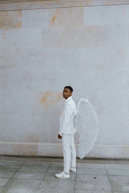 A Man Wearing an Angel Costume