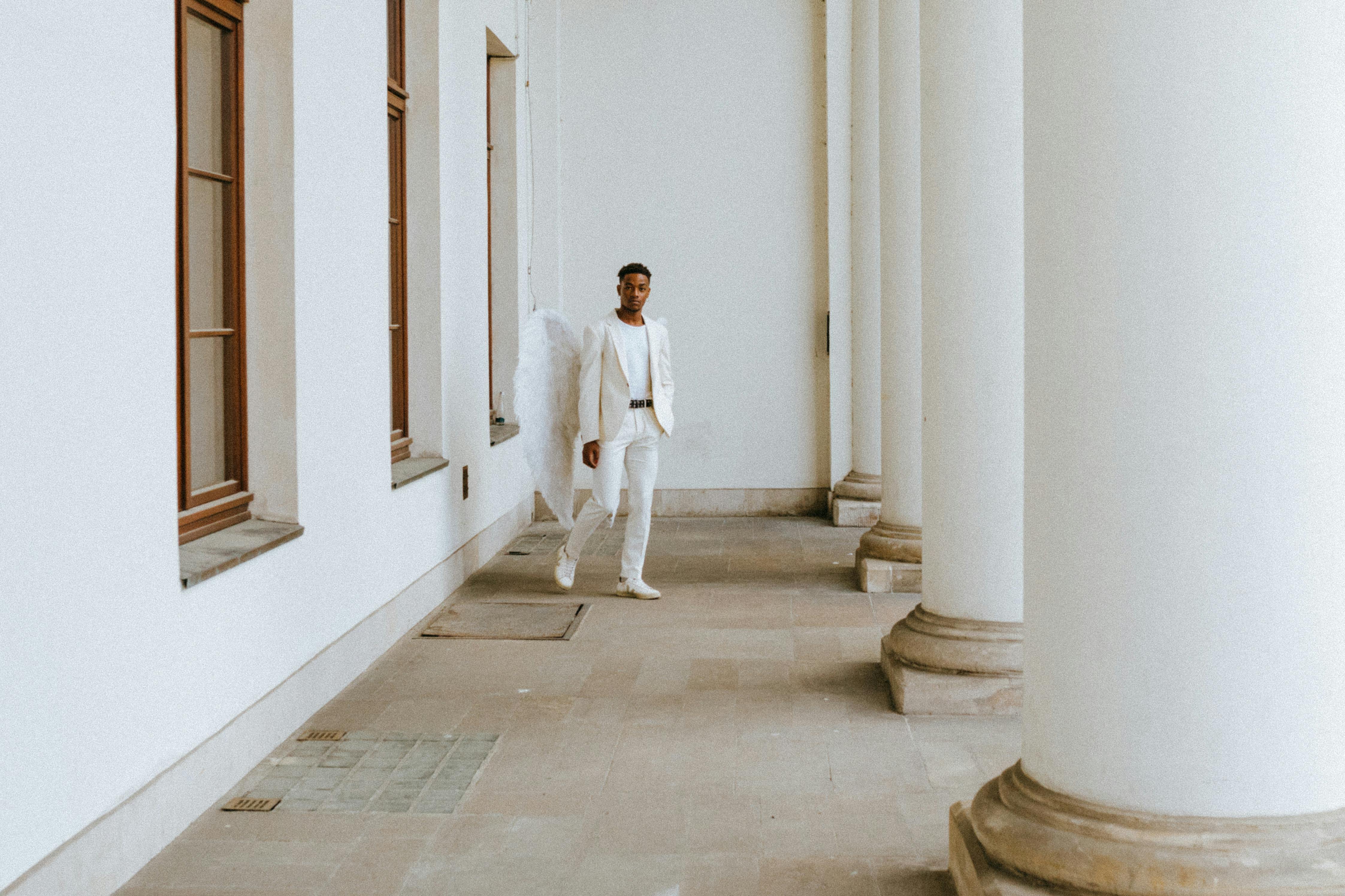 a man wearing an angel costume