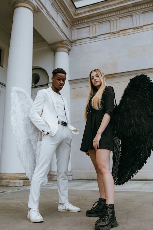 Free A Man and Woman Wearing Angel Costumes Stock Photo