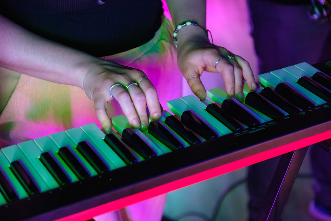 A Person Playing the Keyboard ยท Free Stock Photo