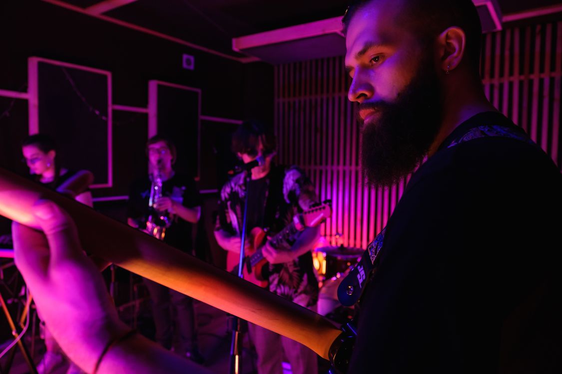 Band Session Musicians Performing Together · Free Stock Photo