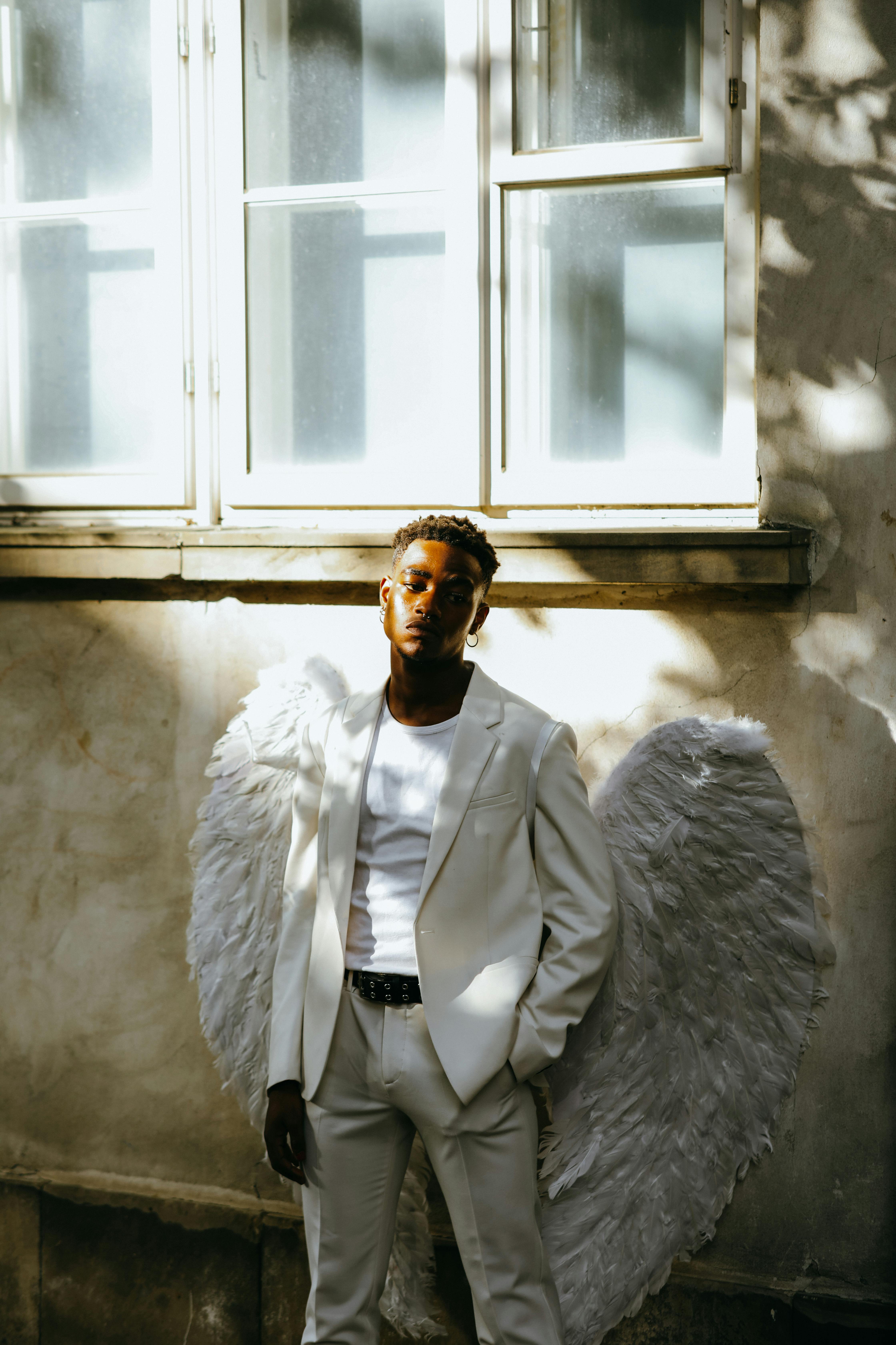 a man wearing an angel costume