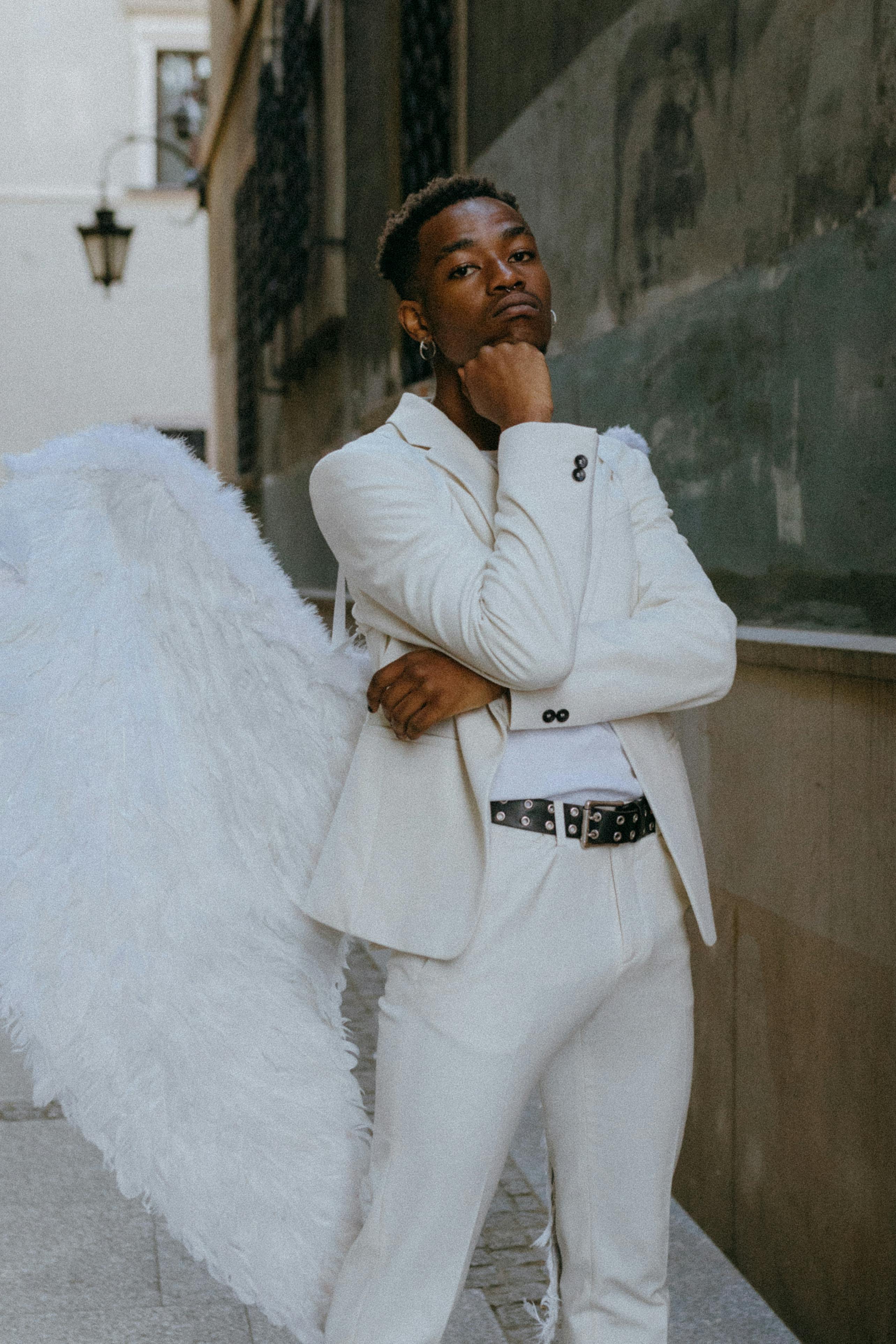 a man wearing an angel costume