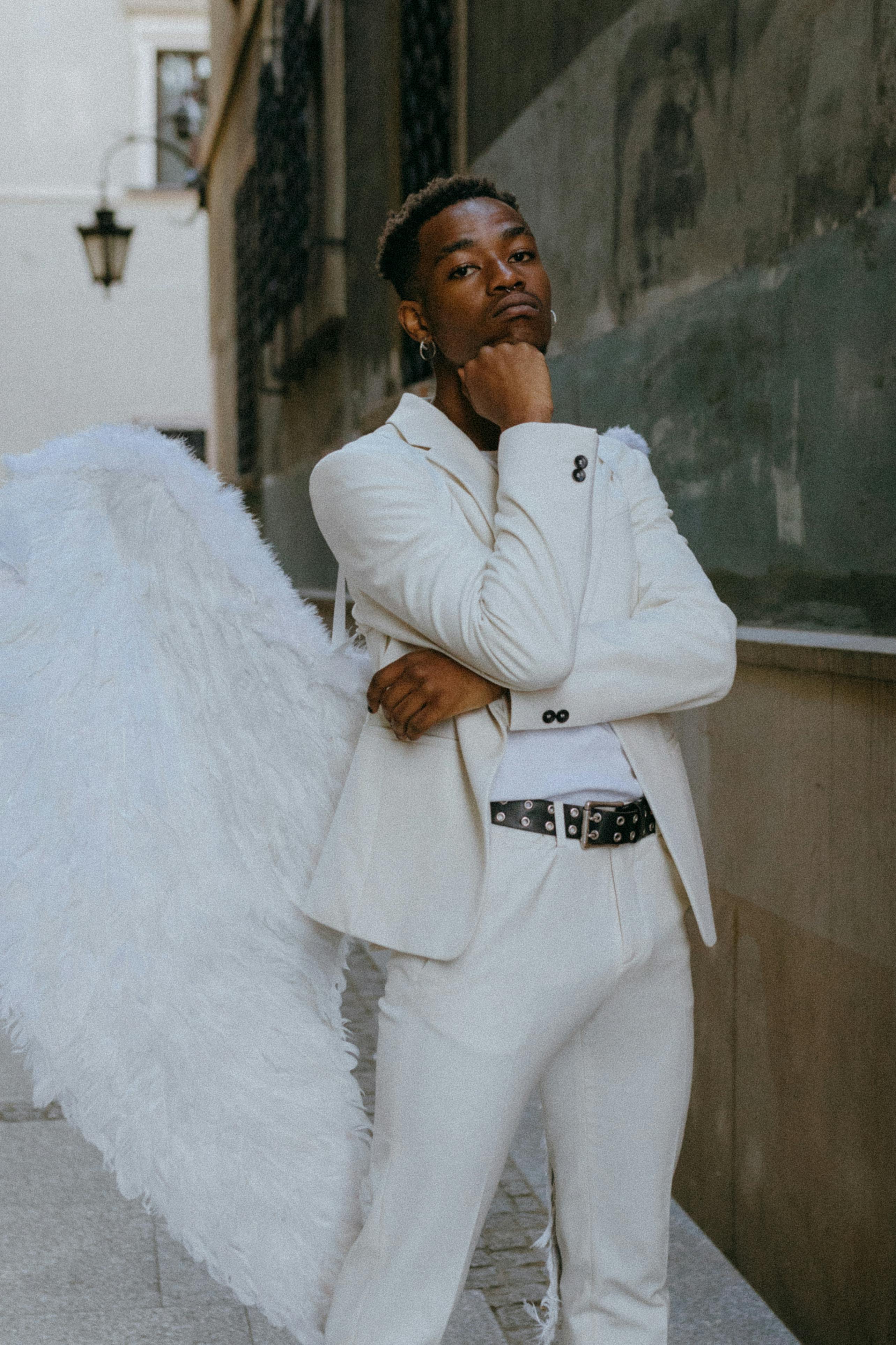 A Man Wearing an Angel Costume · Free Stock Photo