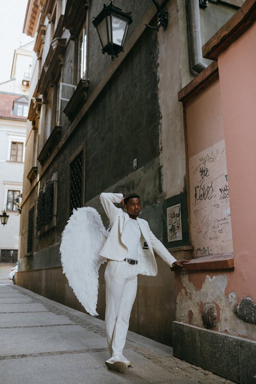 Free An Angel Leaning on a Wall Stock Photo