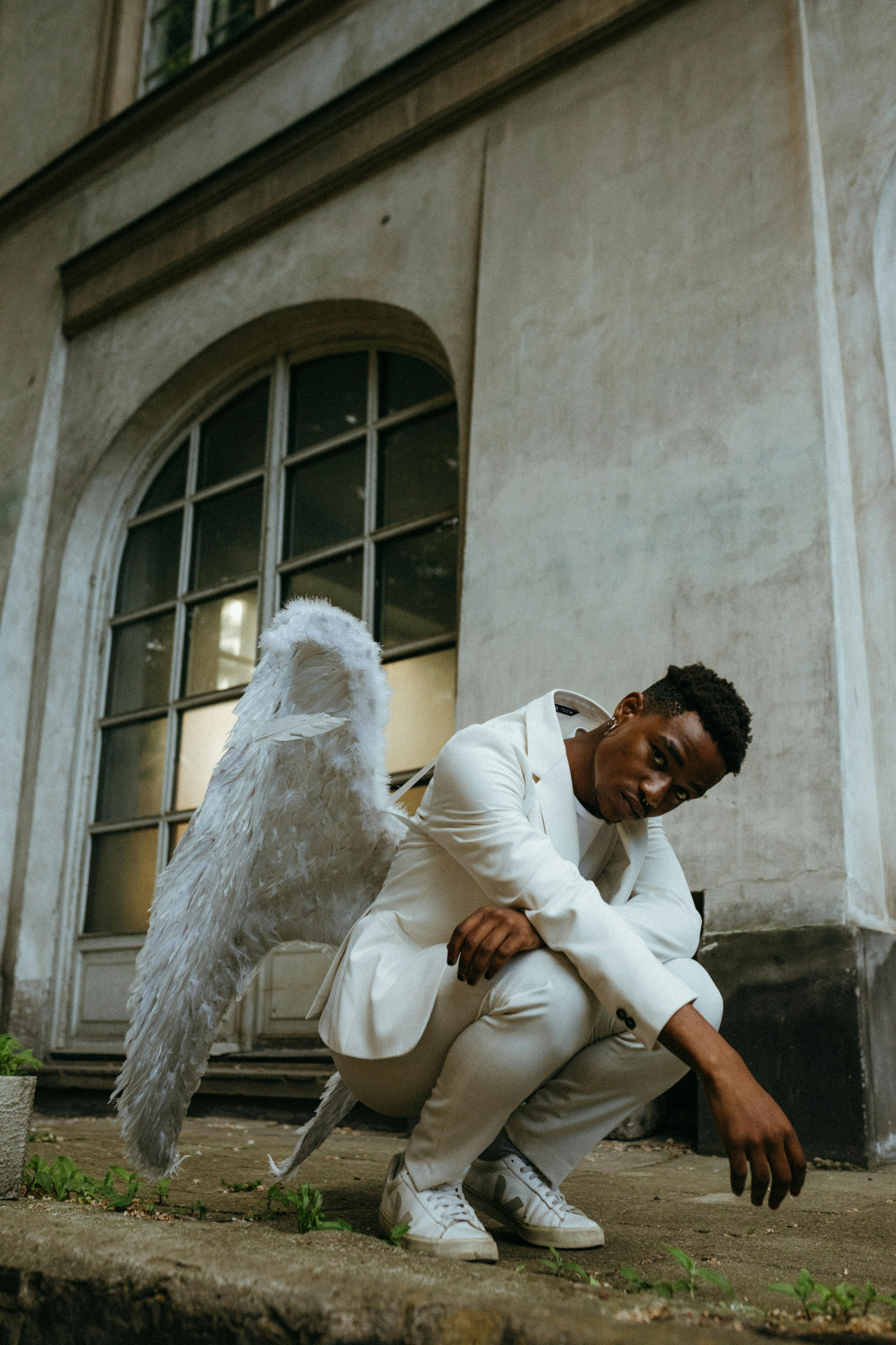 a man wearing an angel costume