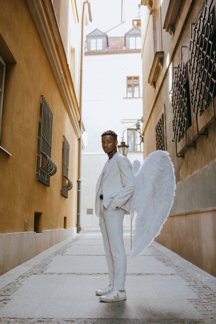 An Angel Standing In An Alleyway